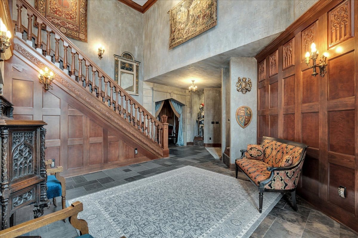 Entry stairs are a statement. Carved banister galore. I mean, cool, maybe too much?