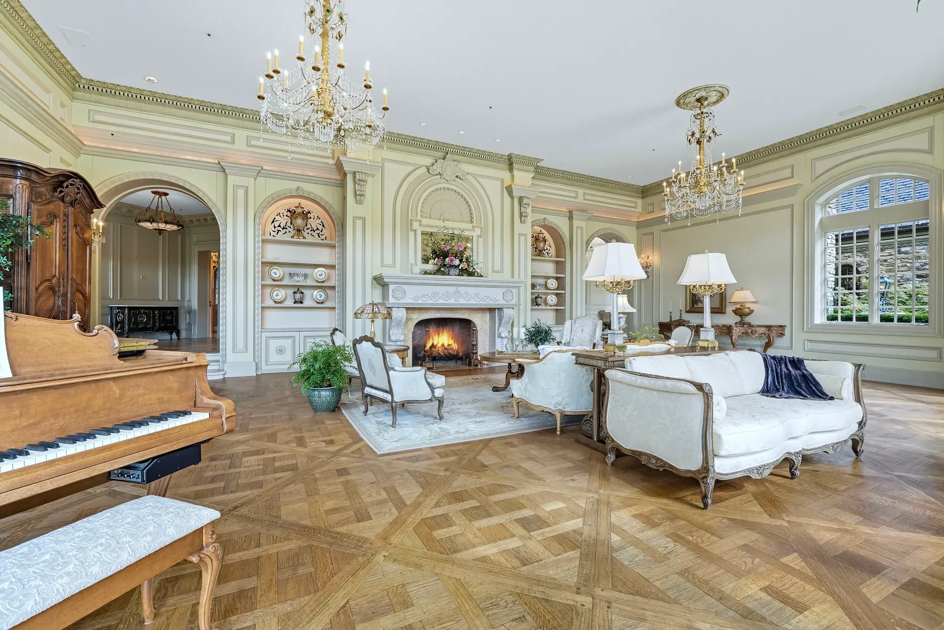 Here's the parlor—soft creams, intricate moldings. Pretty, maybe a bit precious?