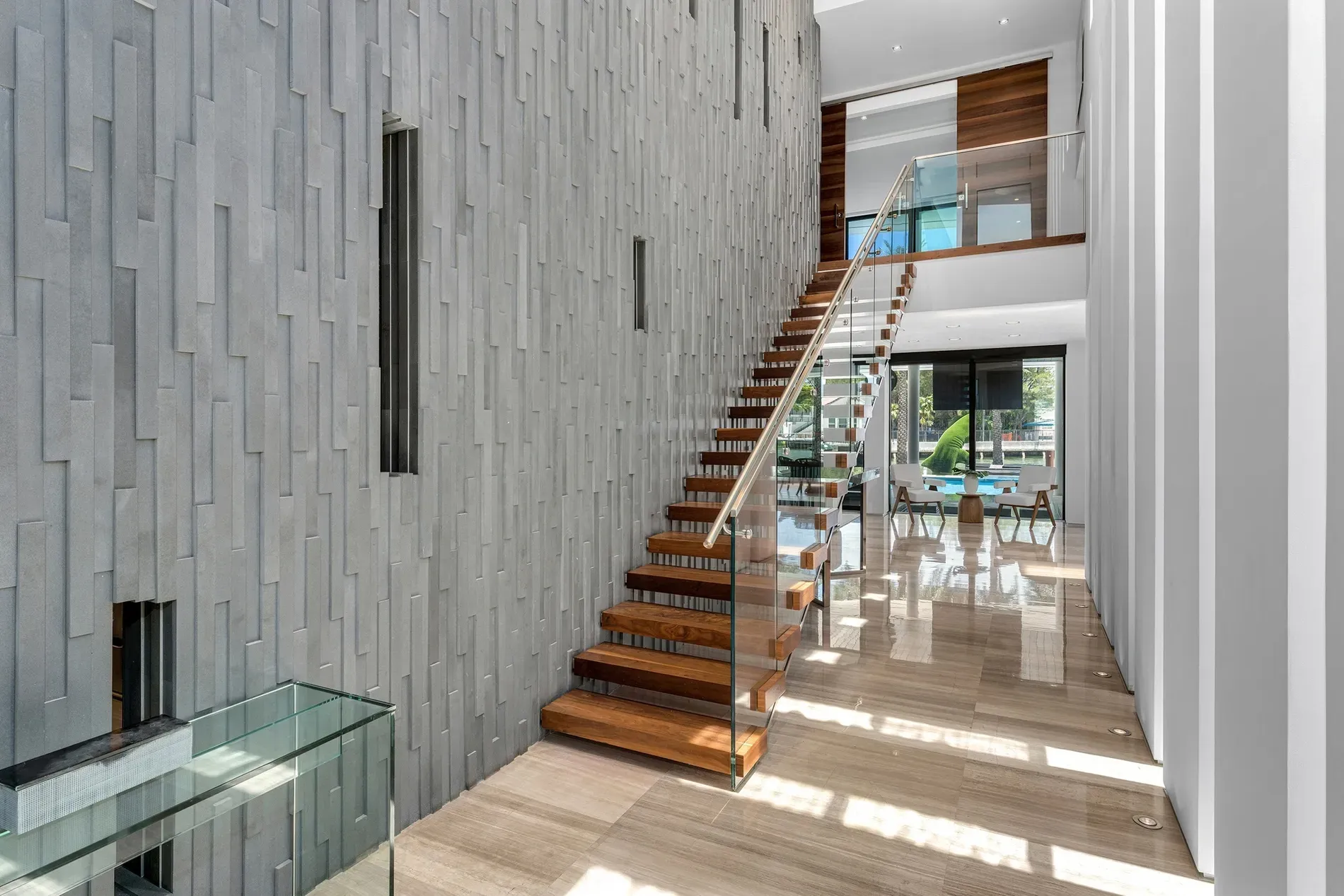 Then this entry — ribbed concrete wall meets warm wood. Kinda love it.