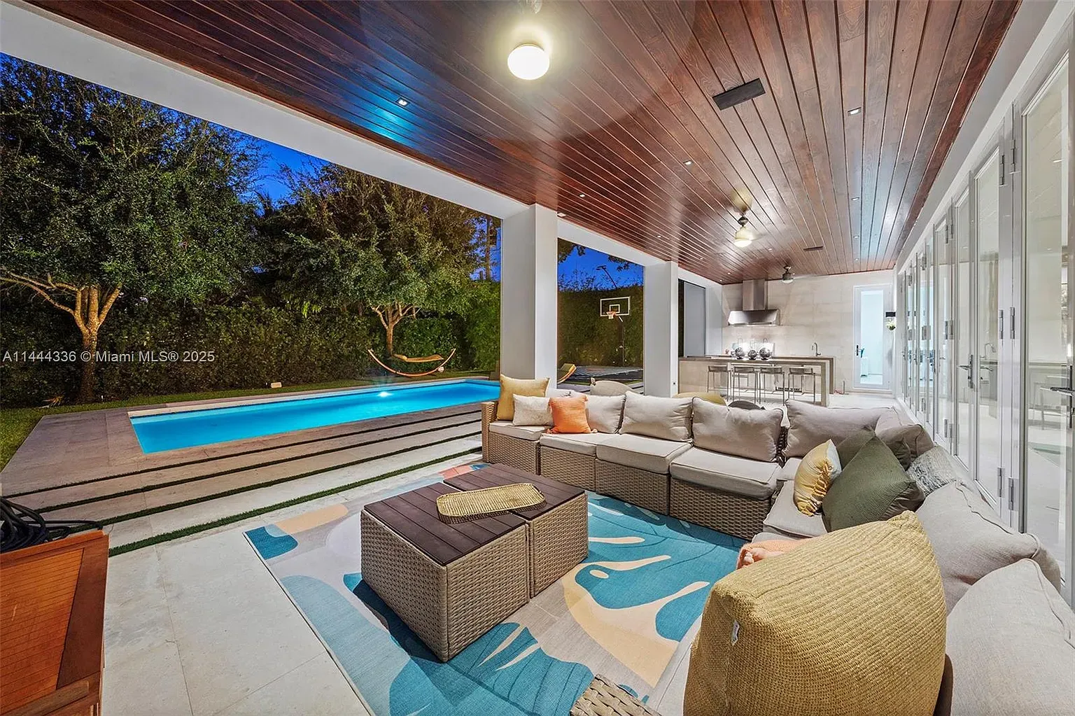 Okay, this pavilion — warm wood ceiling, crisp walls. I mean, nice.