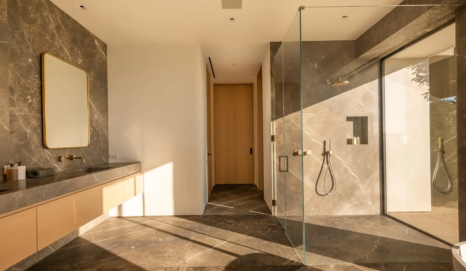 Dark marble spa bathroom. I mean, cool, but maybe too much?