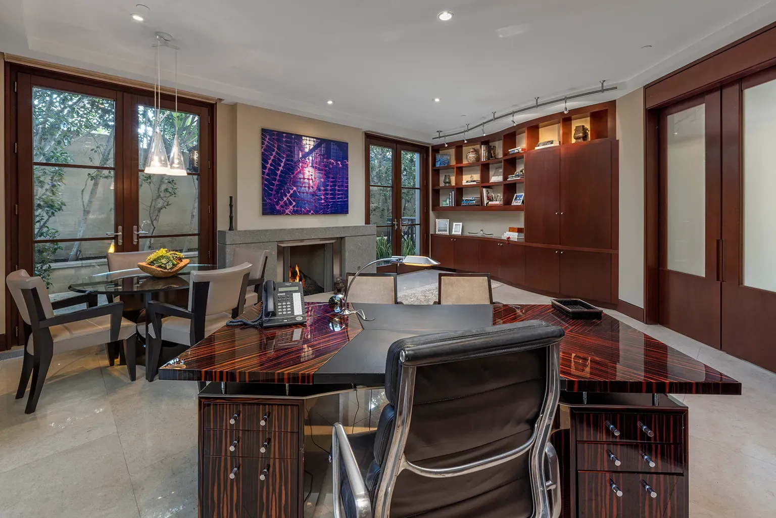 Office flex. glossy ebony desk front and center. Pretty, but smudge city?