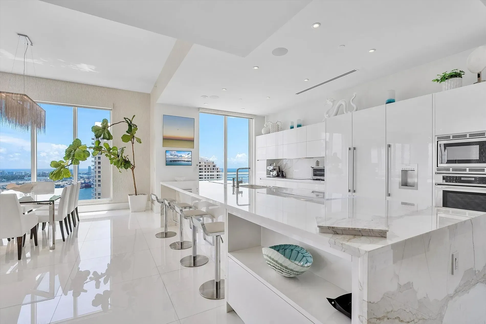 Kitchen is glossy and minimal, city backdrop. Cool, but asking price, really?