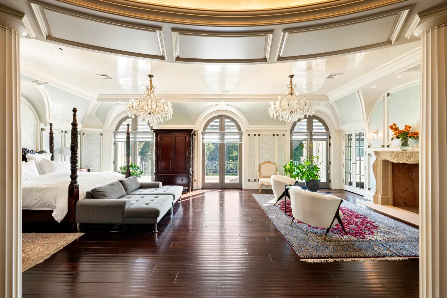 Okay, this bedroom—coffered ceiling, two chandeliers. Do you need both?