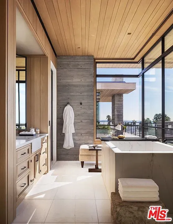 Spa moment. window walls, wood meets concrete. Anyone else worry about privacy here?