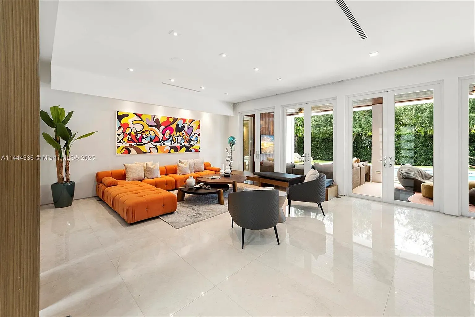 This angle. orange sectional on marble. Bold, fun, maybe a bit loud?