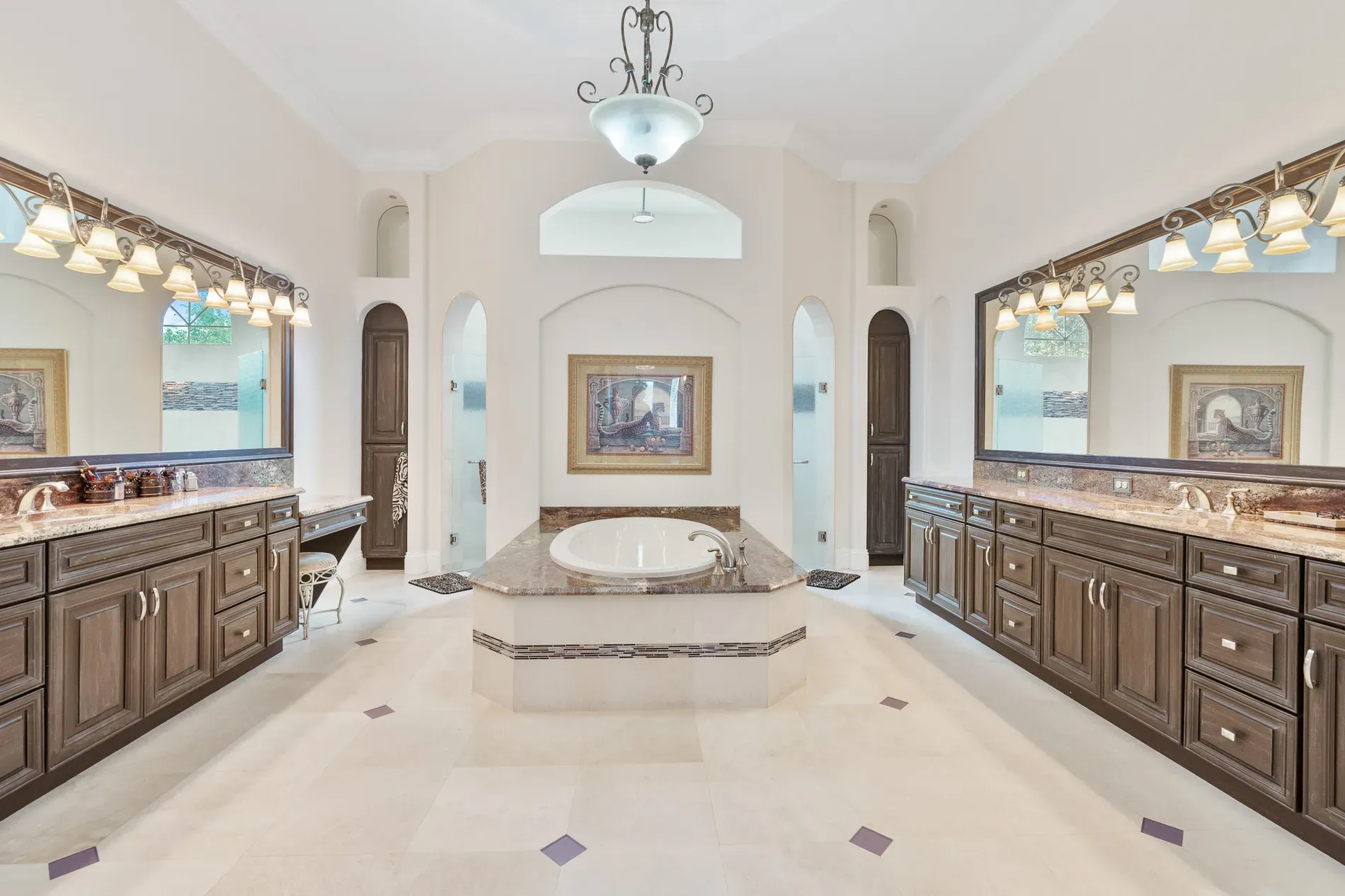 Tub under a chandelier. I mean, dramatic, but kinda amazing.