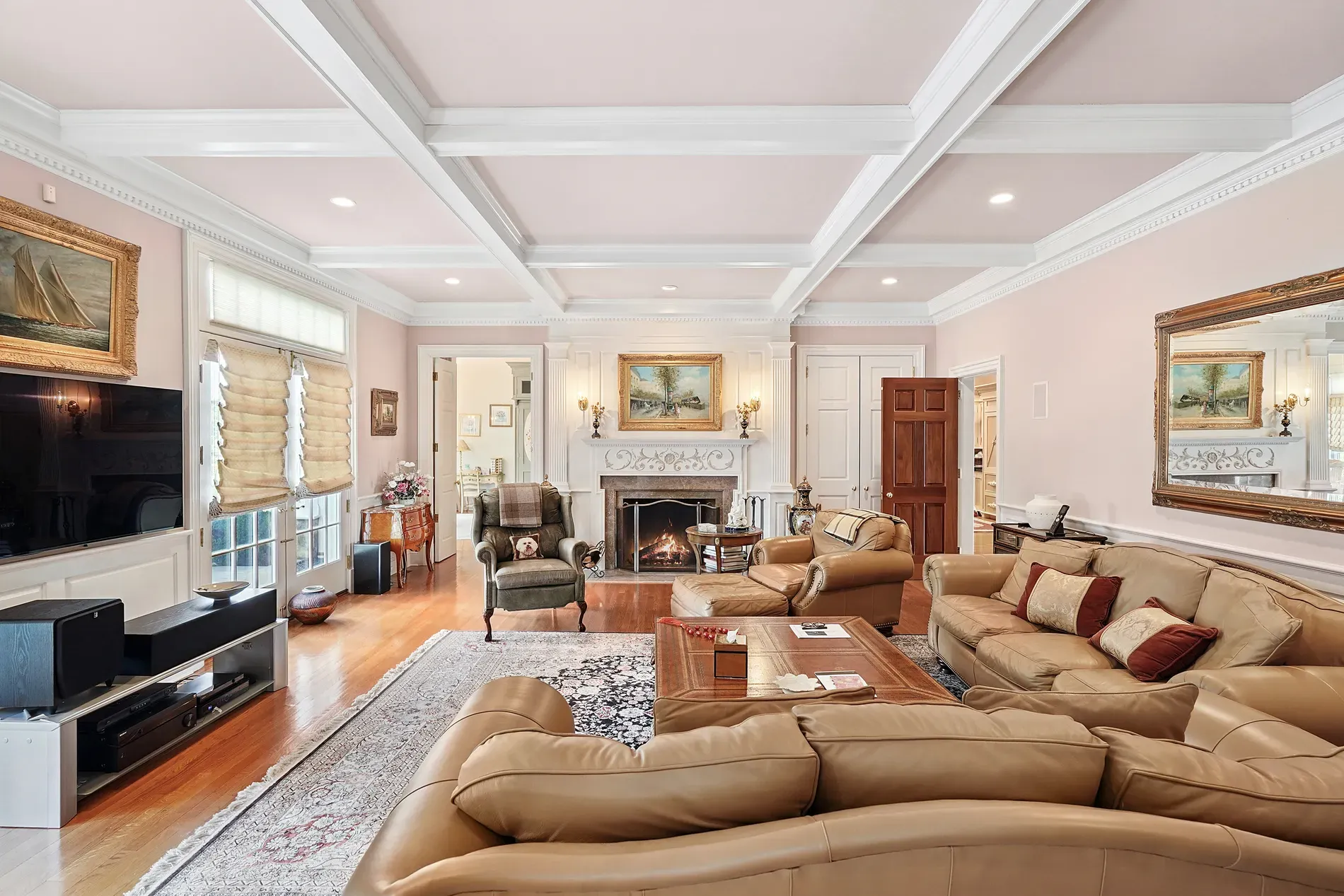 From this angle, that pastel coffered ceiling pops. crown molding’s doing overtime.