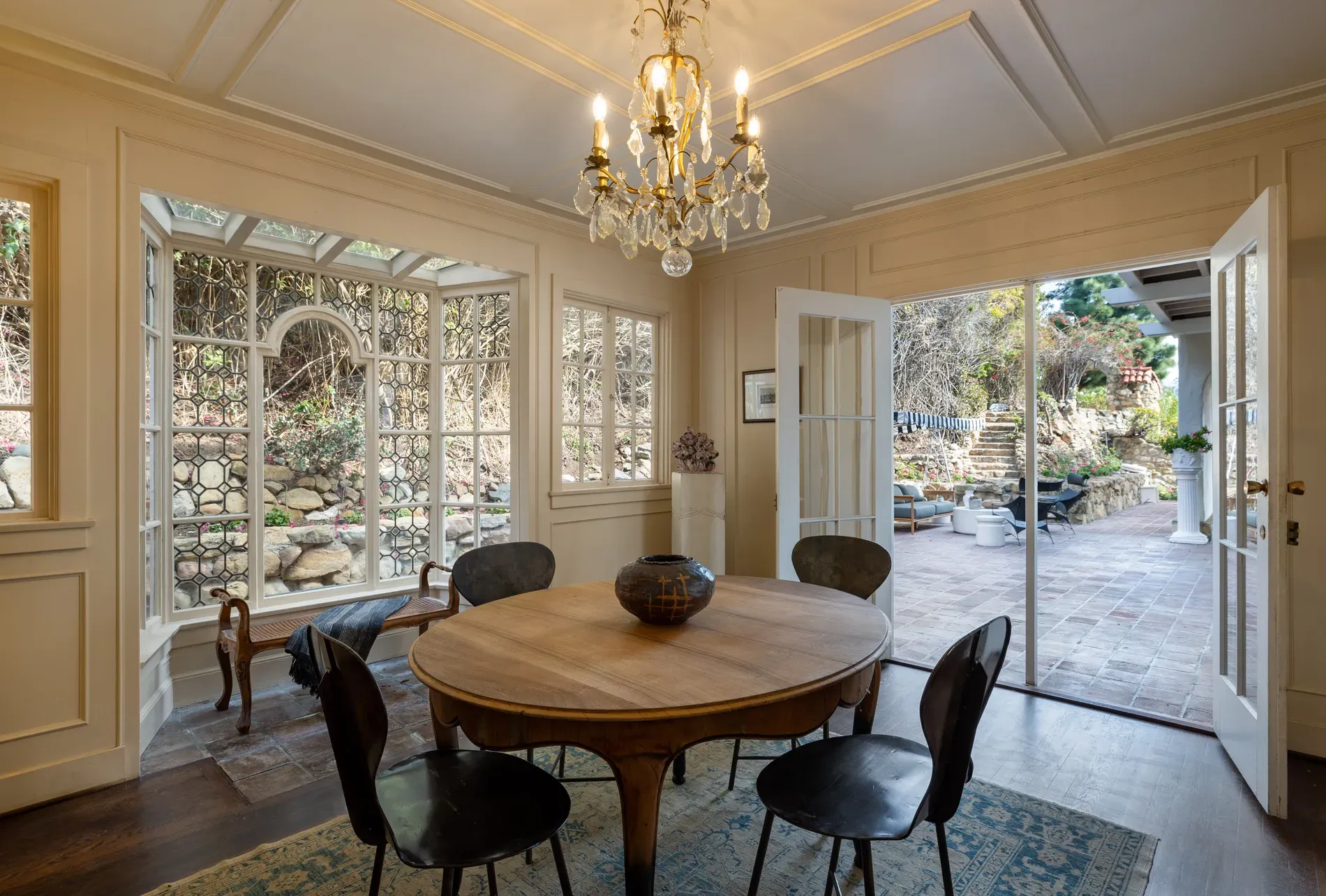 Formal dining — crystal chandelier, wainscoting. I mean, cool, but maybe too much?