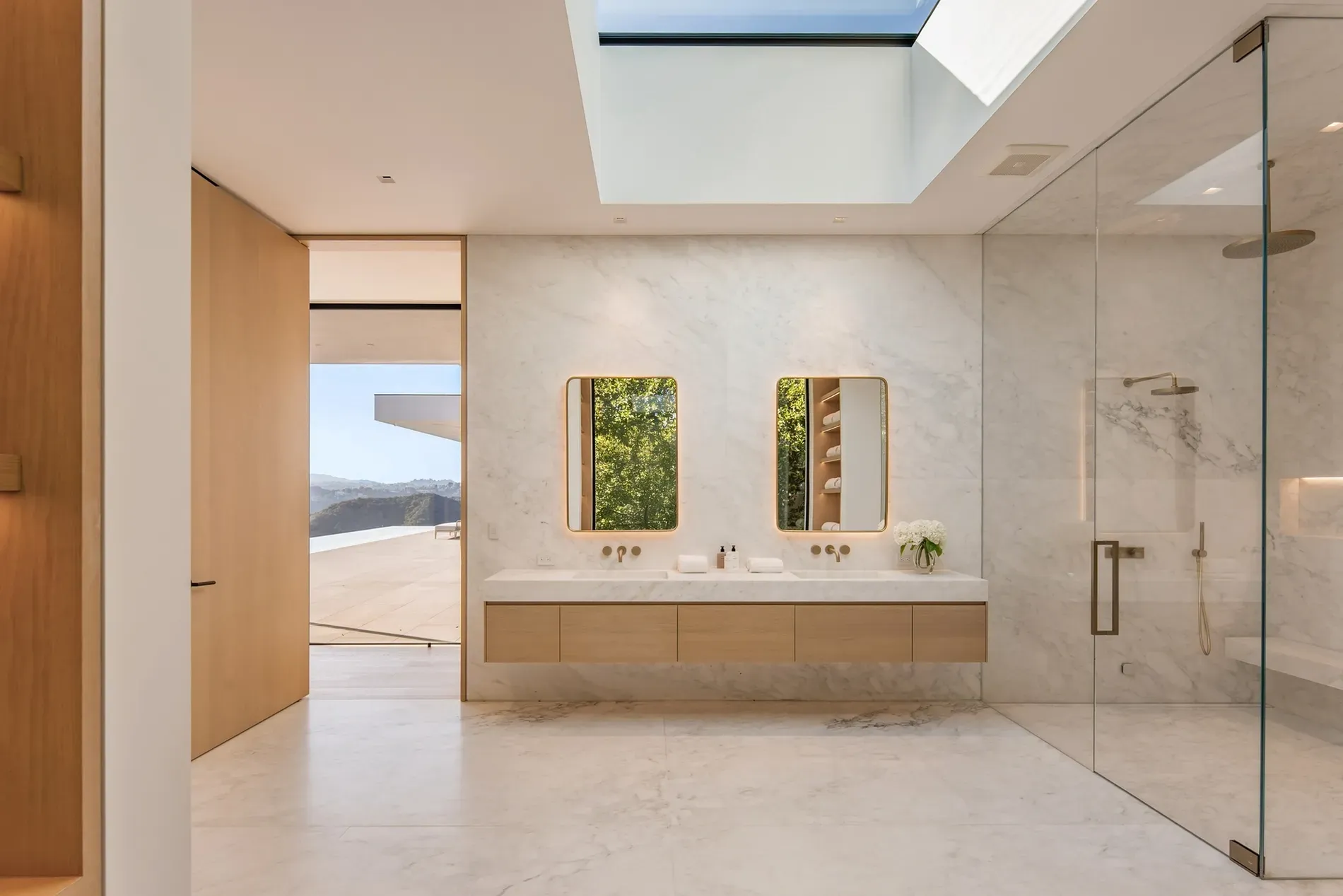 All-white marble and a double vanity flex. Anyone else missing color?