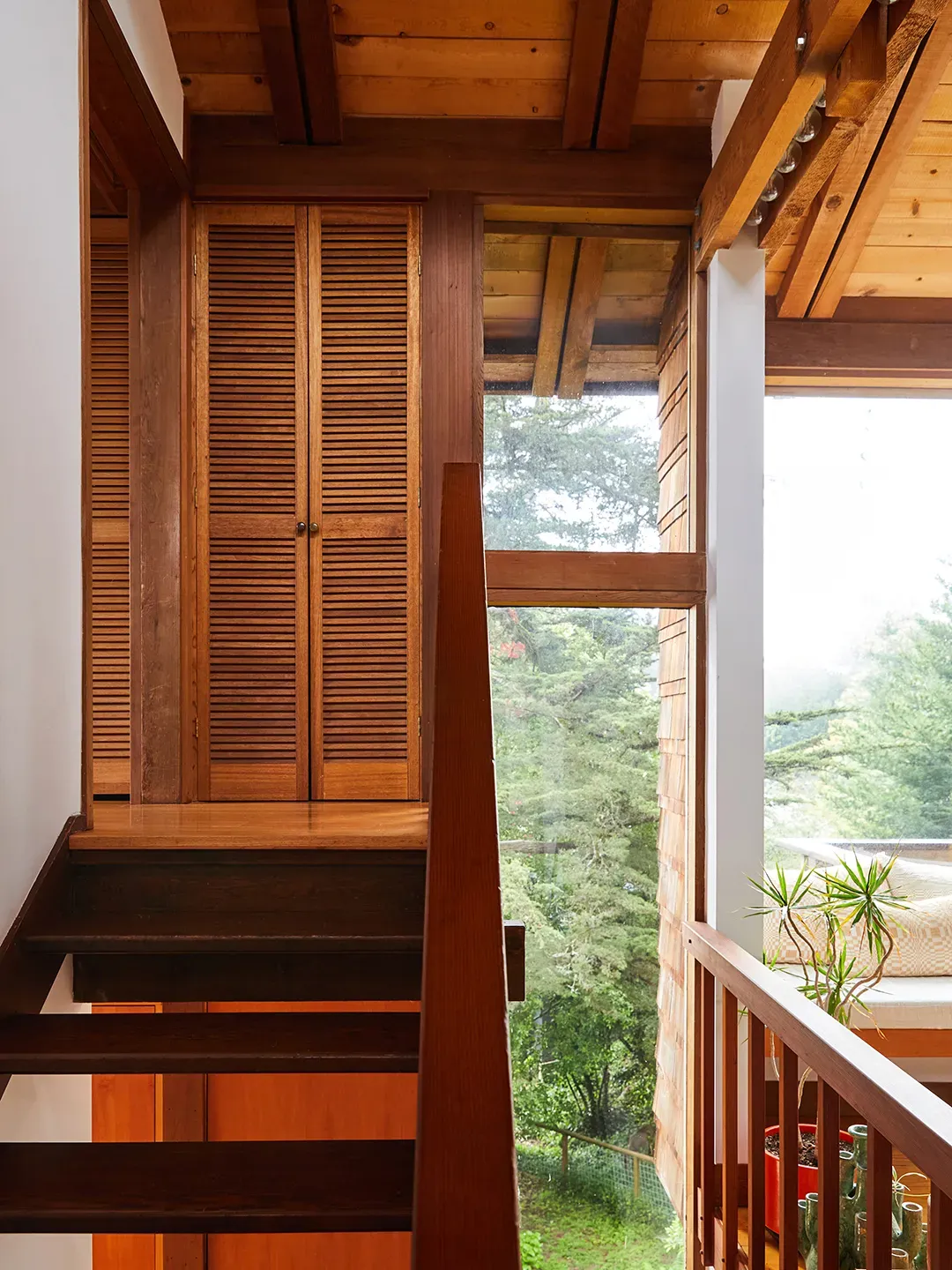 And then this stair—dark treads, light beams. Anyone know why the split?