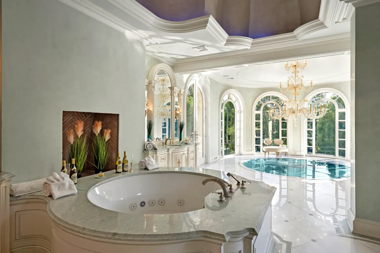 Mint walls, classic trim, glam sconces. Calm spa energy here.