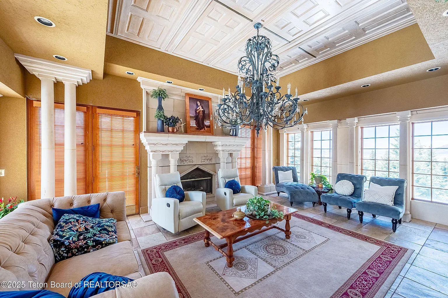 Coffered ceiling flex. Beige and dark wood combo actually looks cozy here.