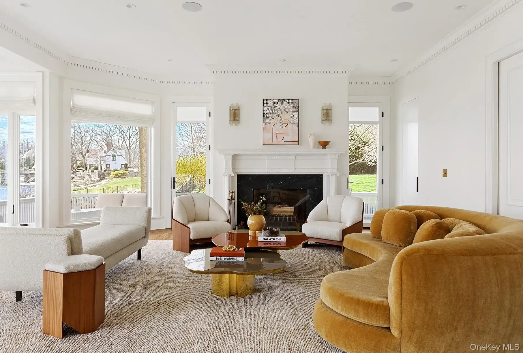 Bright living room with green views. Couch naps would hit different.