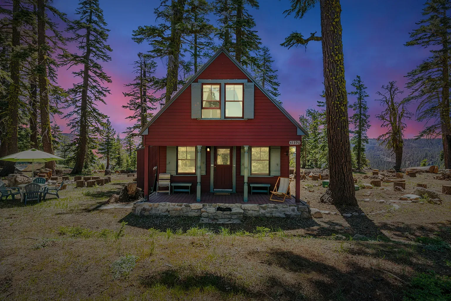 Deep red A-frame peeking through the trees. Looks super tucked away.