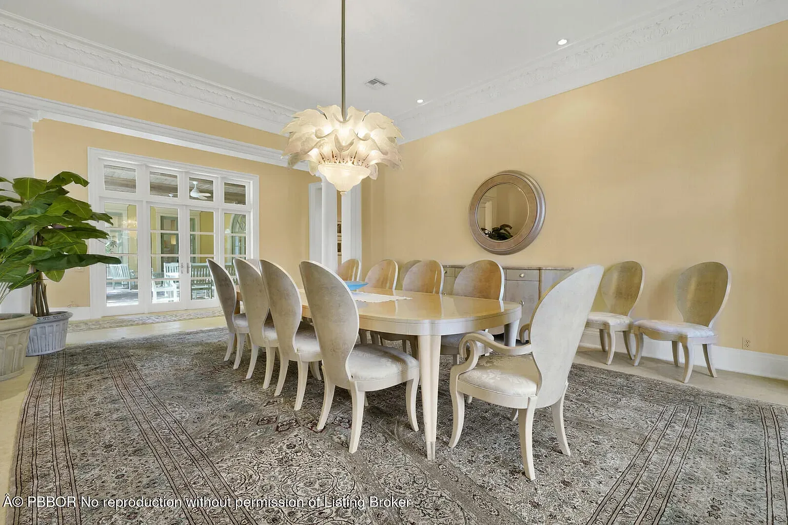 Twelve chairs around an oval table. Big dinner energy. Why so many?
