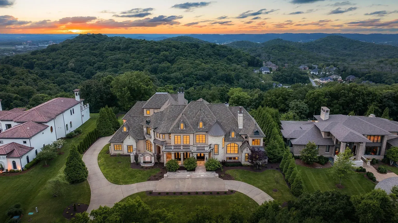 Stone-and-wood mansion perched up here, sunset views for days.