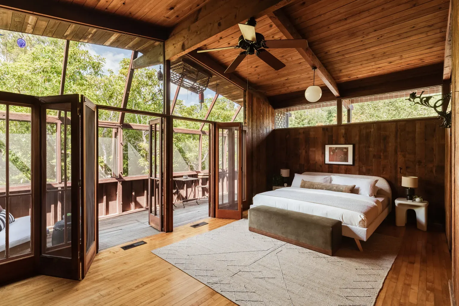 Calm bedroom. Low platform bed, big windows, everything is quietly zen.