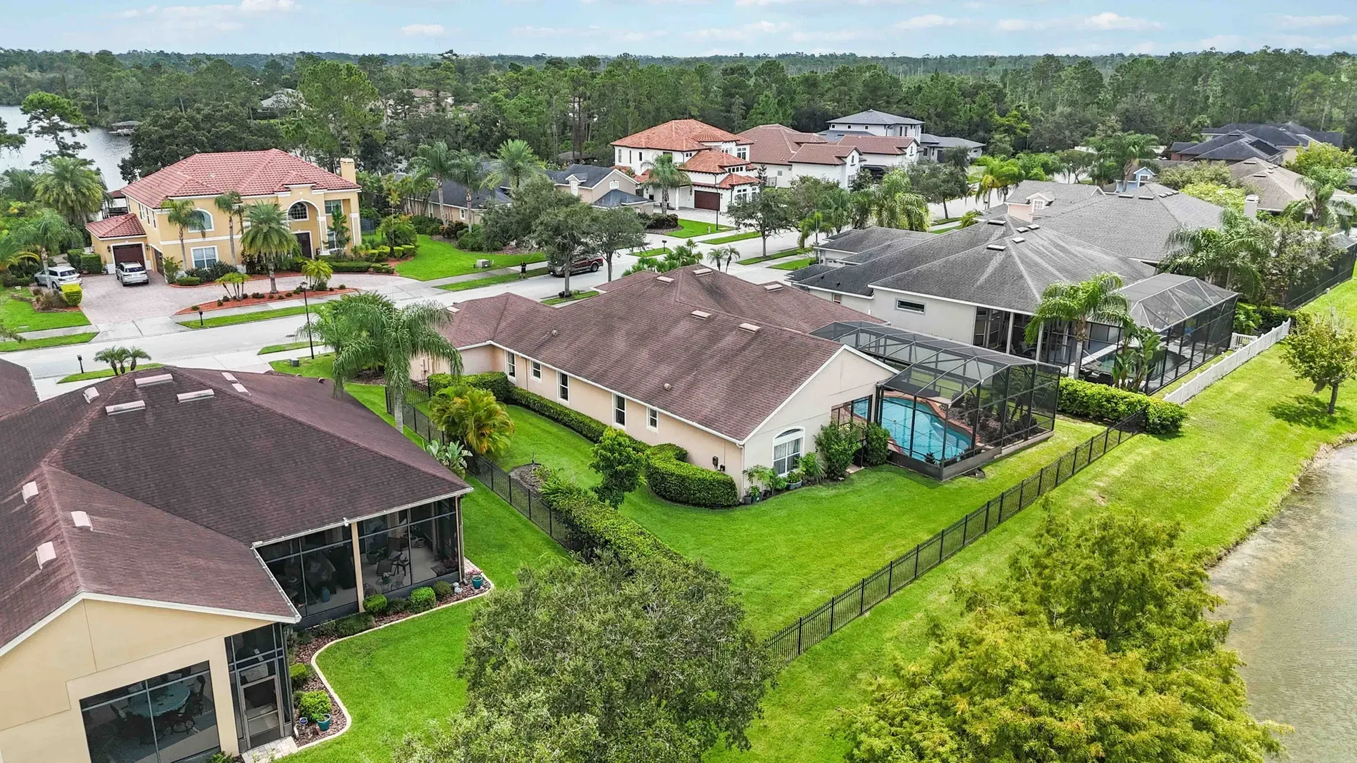 Quiet street, green lawns, matching shrubs. From this angle, very postcard.