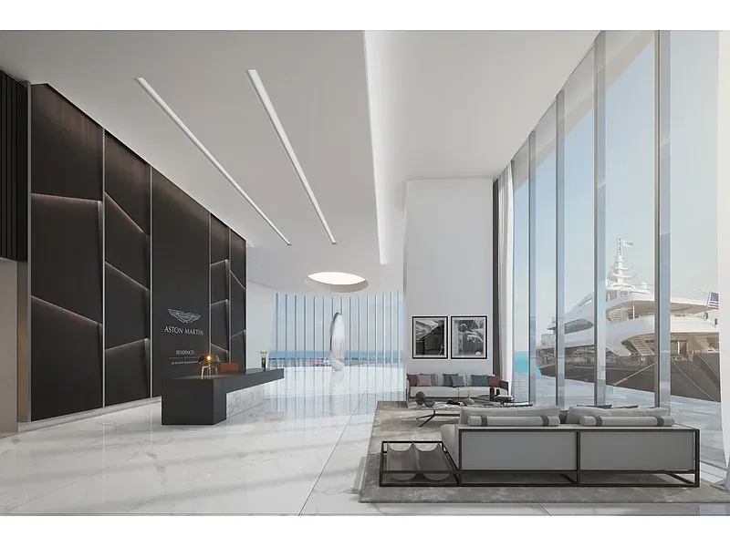 Monochrome lobby vibes. Sharp lines, shiny floors, big glass flexing the view.