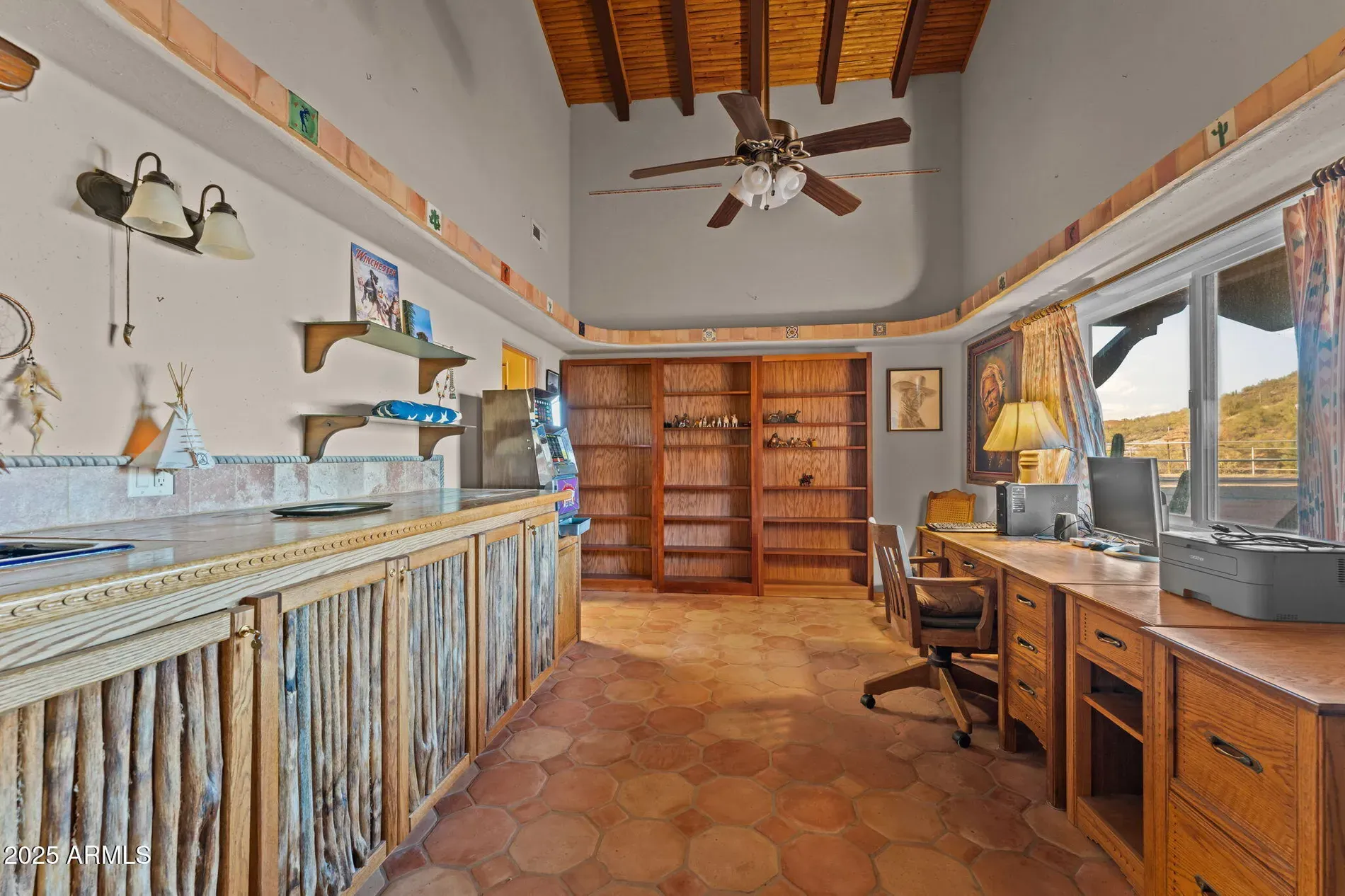Terracotta floors and those huge beams. Feels airy and warm.