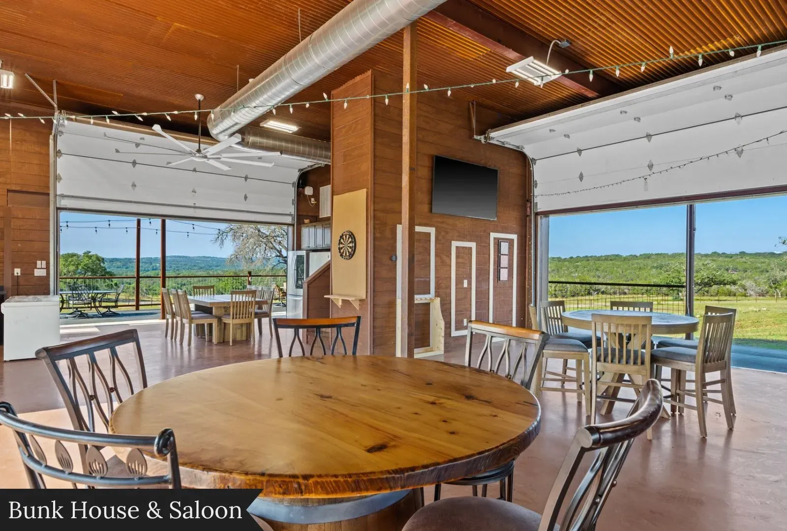 Big gathering room. Beams for days. Glossy wood, hmm. at this price?