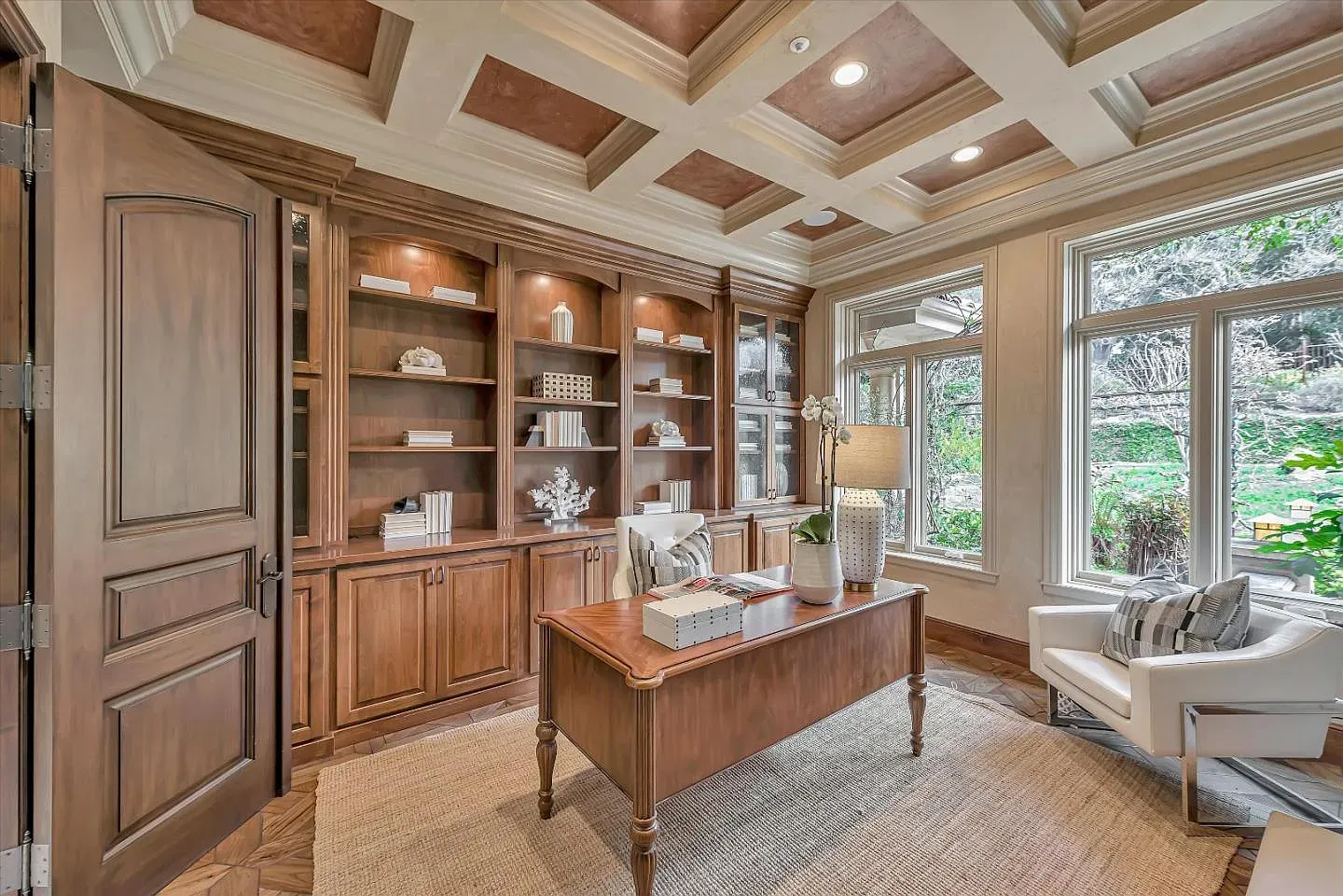 The office is all dark wood and shelves. Feels serious in a good way.