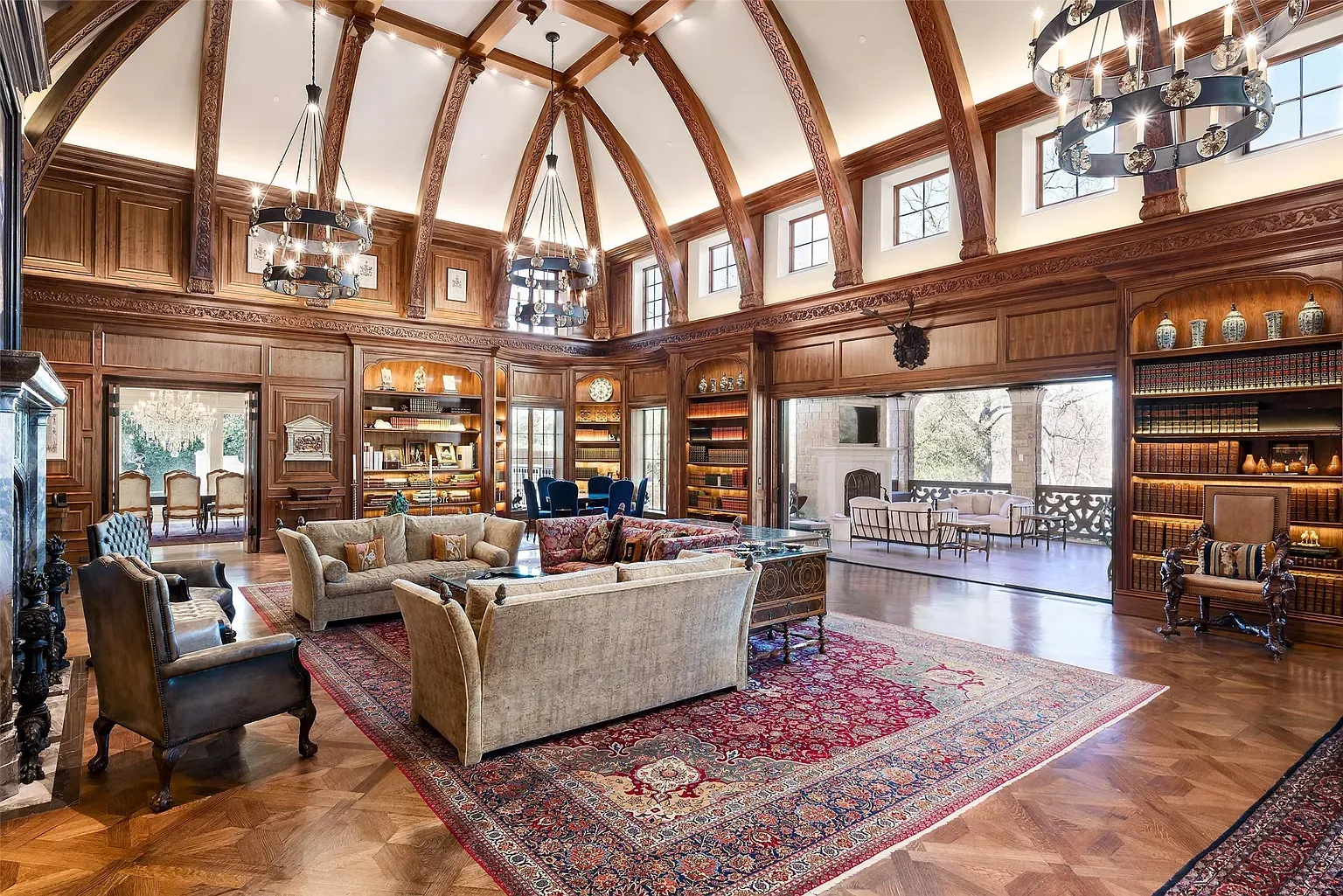 If I disappear, check here. Vaulted library, arched beams, pure mahogany cocoon.