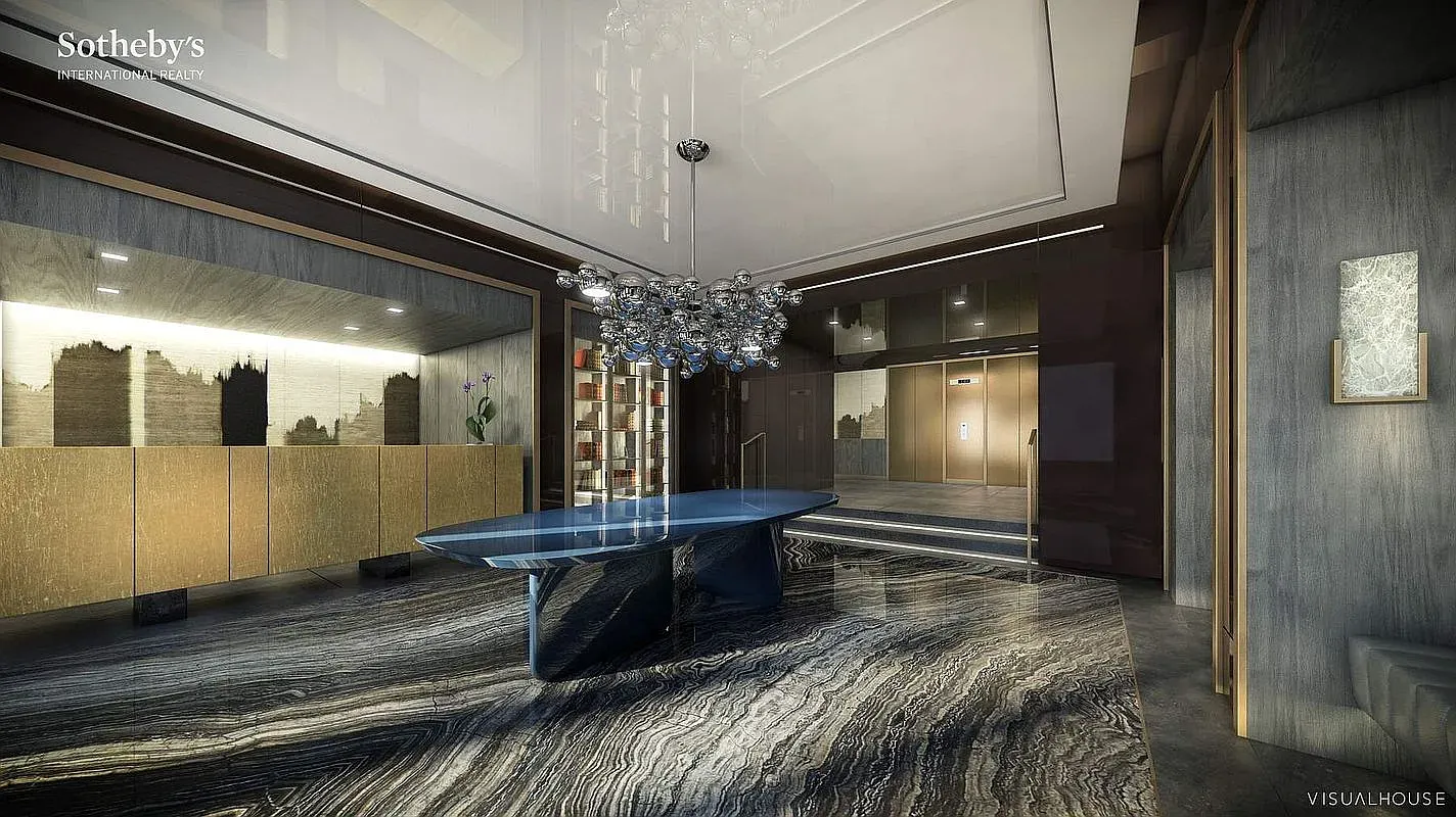 Blue glass desk on wavy marble. Anyone know why they did this?