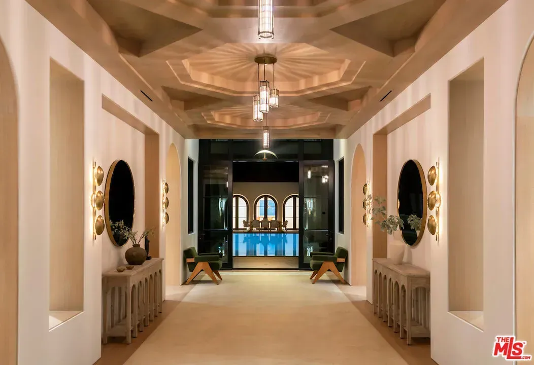 Hallway goes creamy with geometric ceiling. From this angle, it feels endless.
