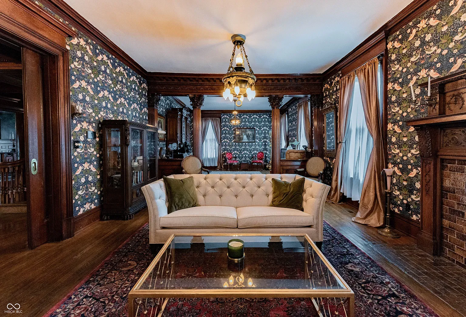 Formal living with wainscoting for days. Feels grand but still livable.