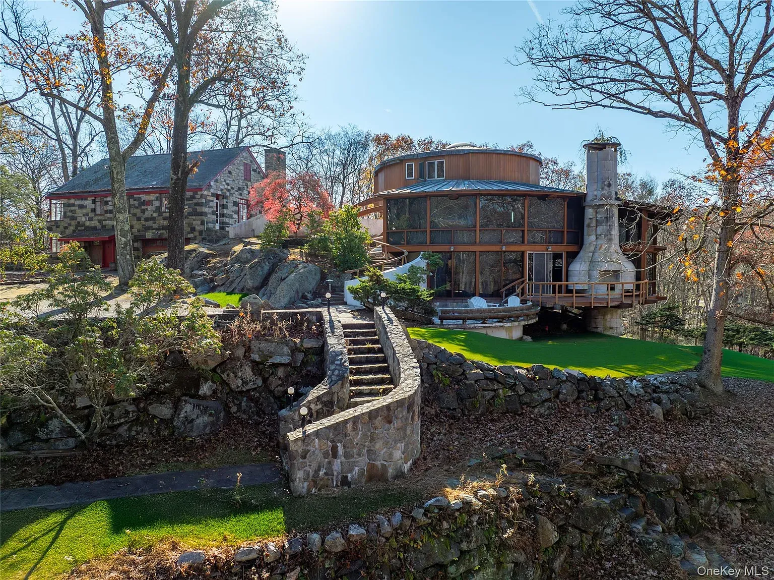 Stone meets wood, tucked into the hillside. Very Hobbit-adjacent in a good way.