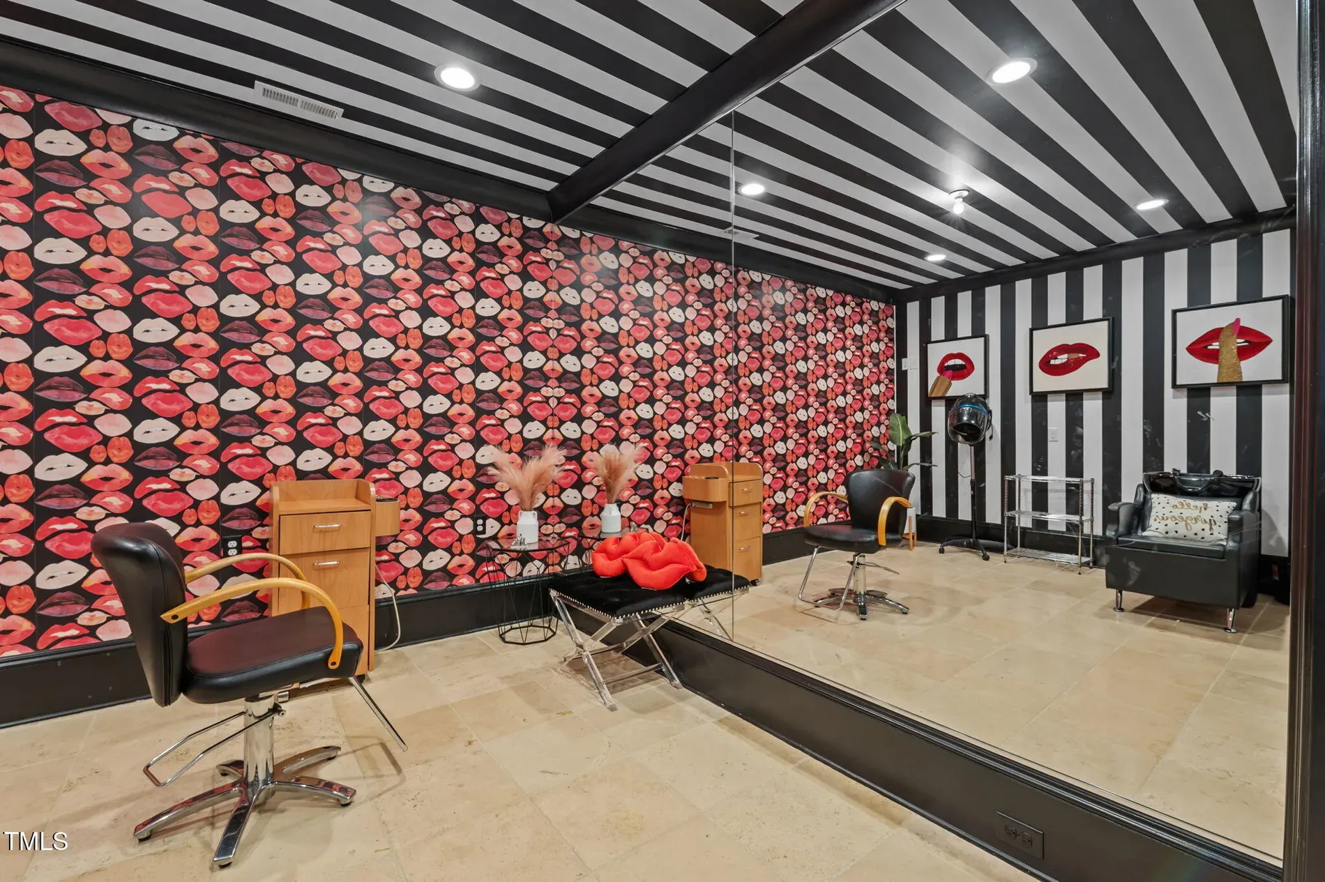 Okay, this wallpaper—giant lips everywhere. Why? It’s fun, maybe too much.