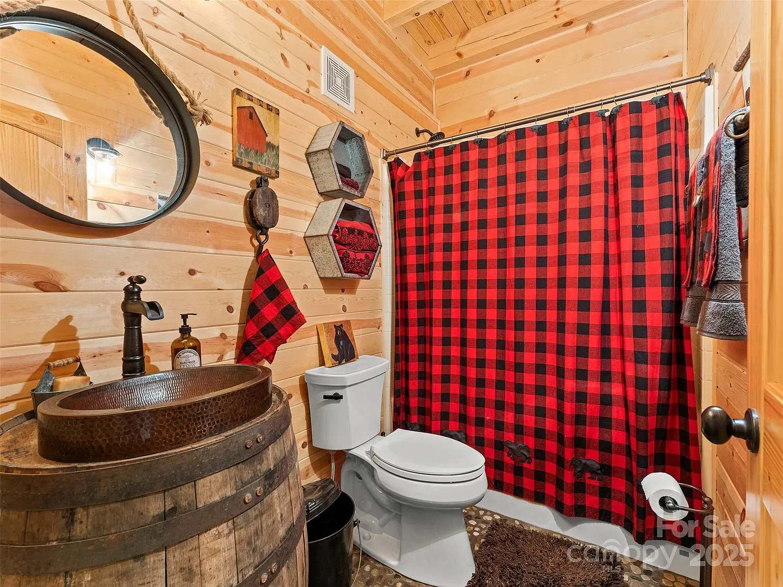 Second bathroom keeps the cedar theme going. Cozy without feeling dark.