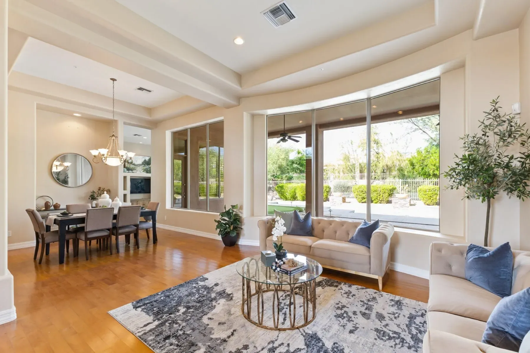 Huge windows pulling the garden inside. Bright without feeling sterile.