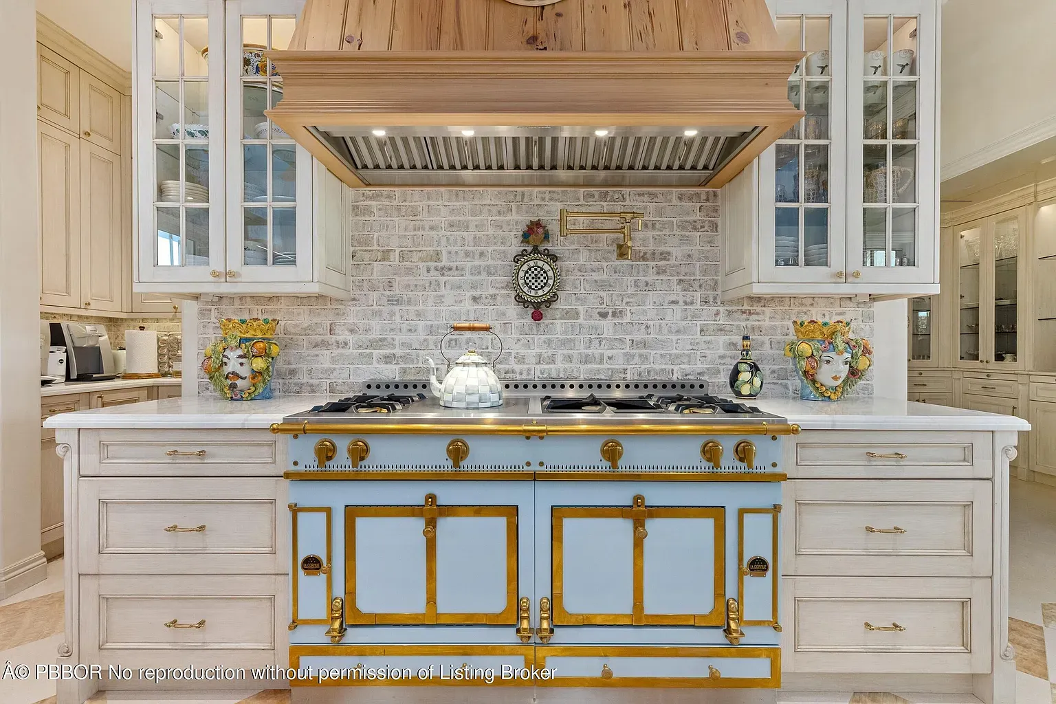 Okay, this stove—soft blue with brass. Kinda obsessed, not gonna lie.