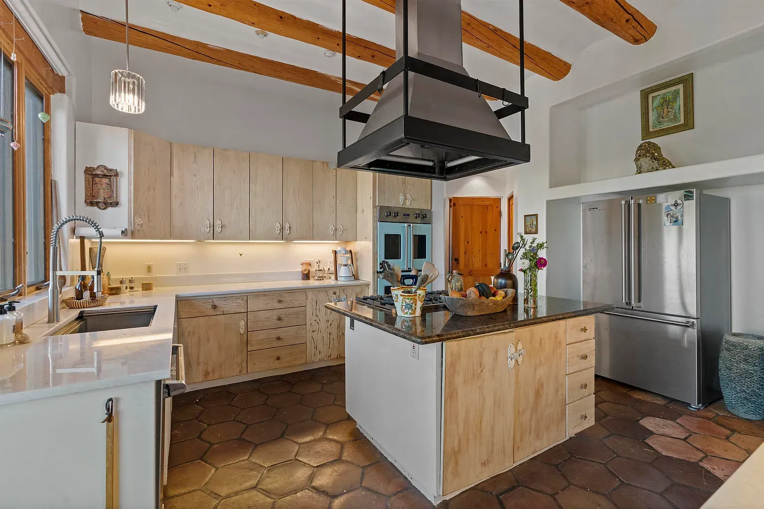 Granite with little gold sparkles? I’m sold. Also, those cabinets are legit.