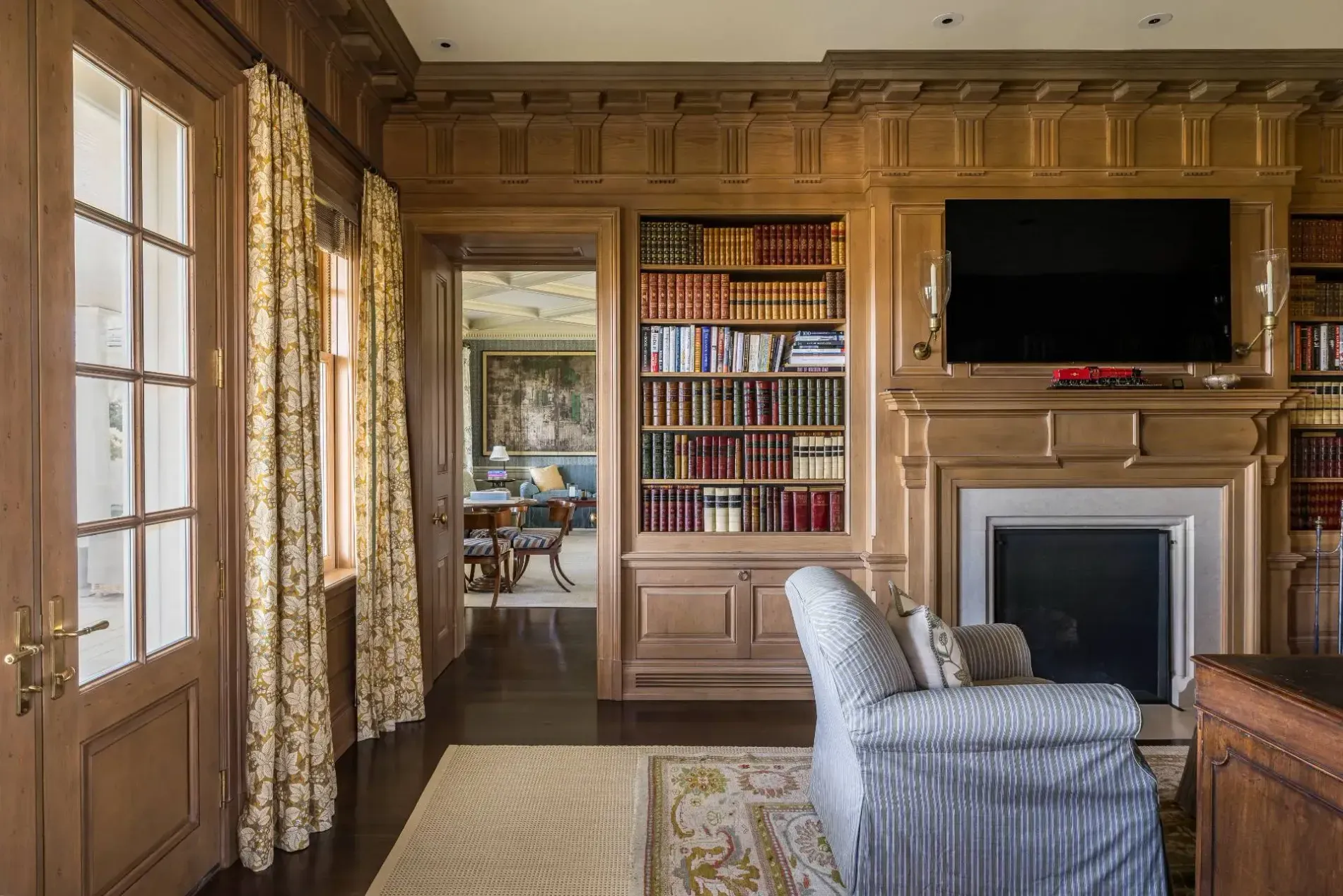Panelled study, proper fireplace. Smells leather and old books in my head.