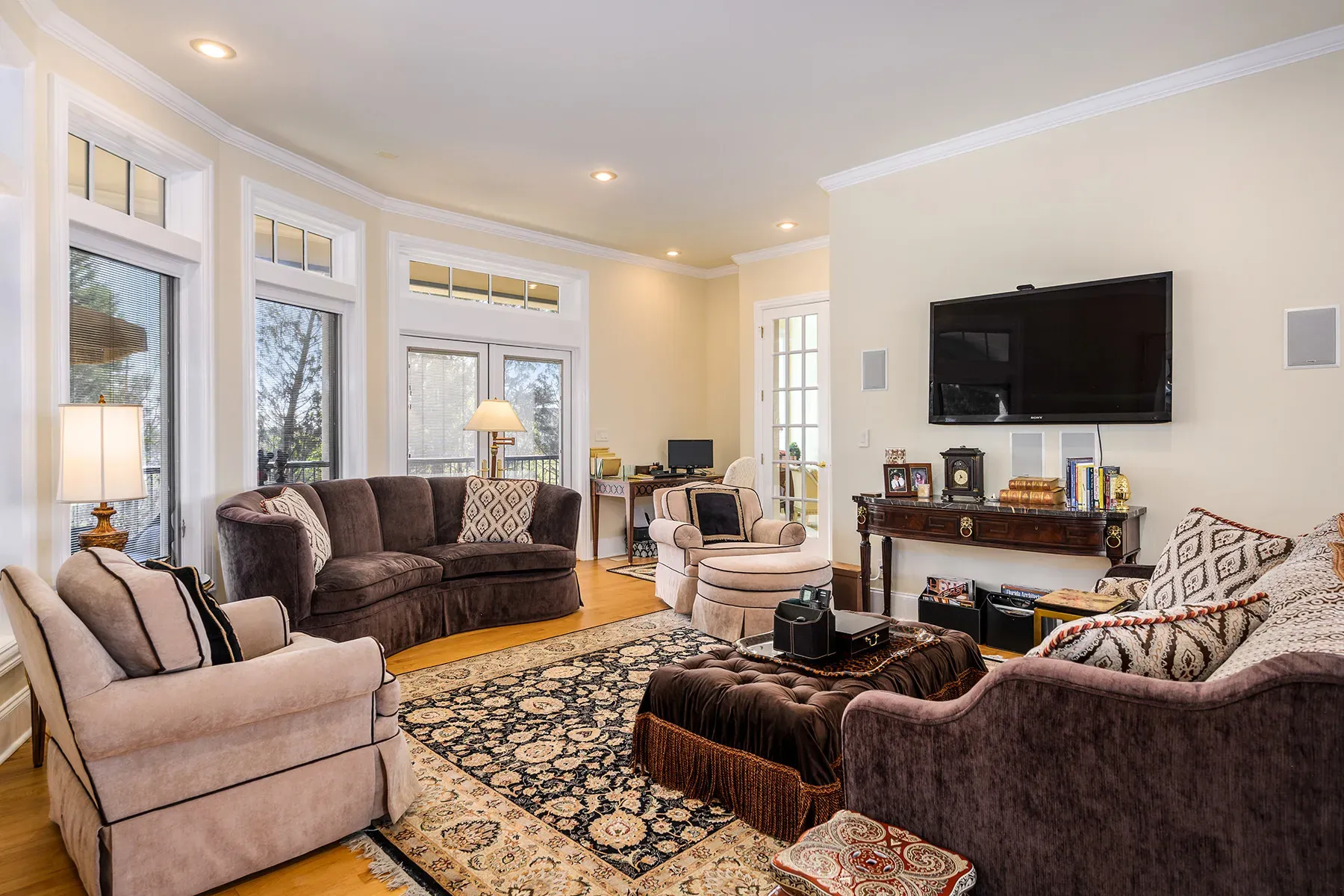This living room is beige-on-beige with chocolate accents. Cozy or hotel?