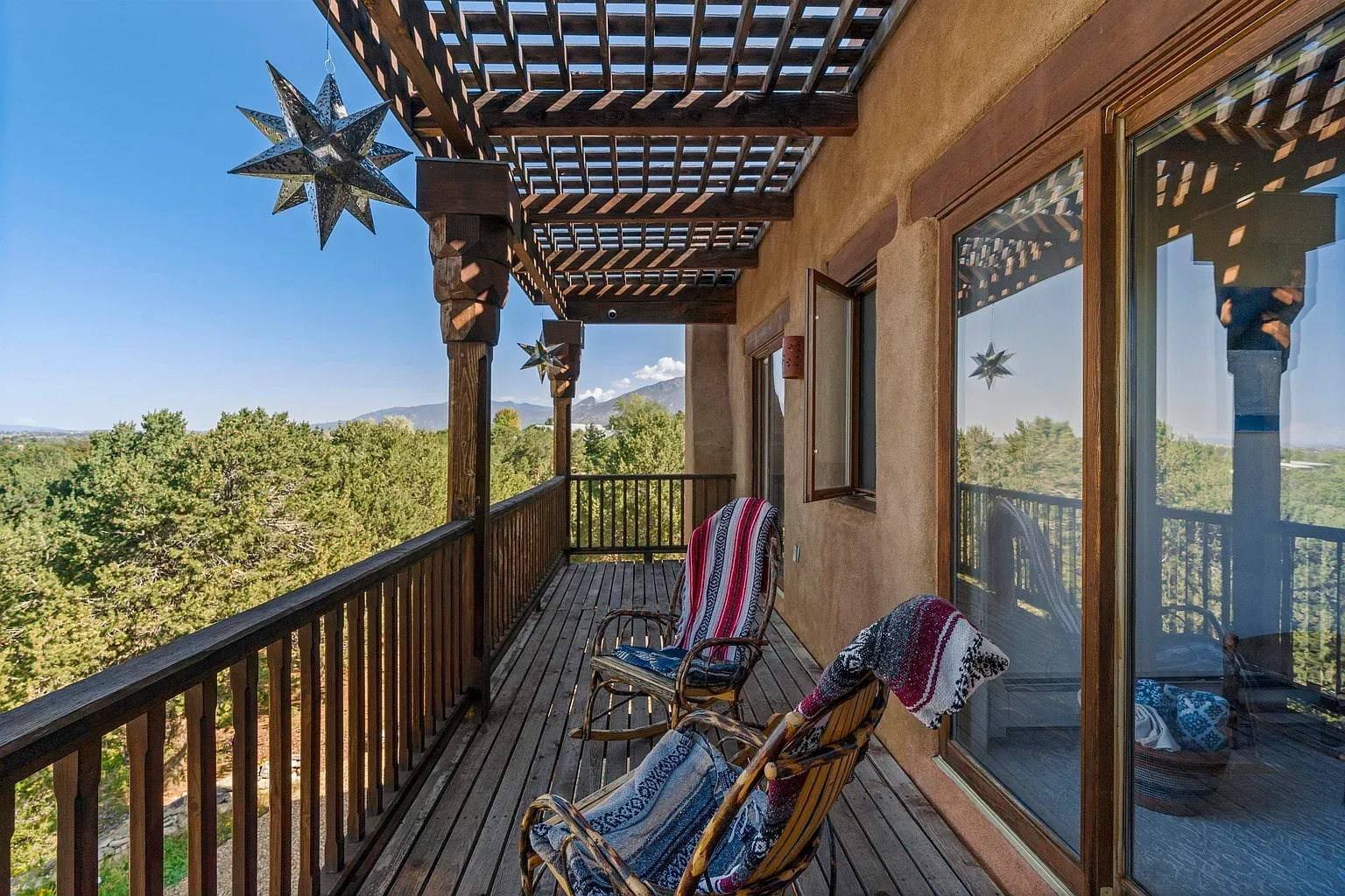 If I had this pergola deck, I'd never go back inside.