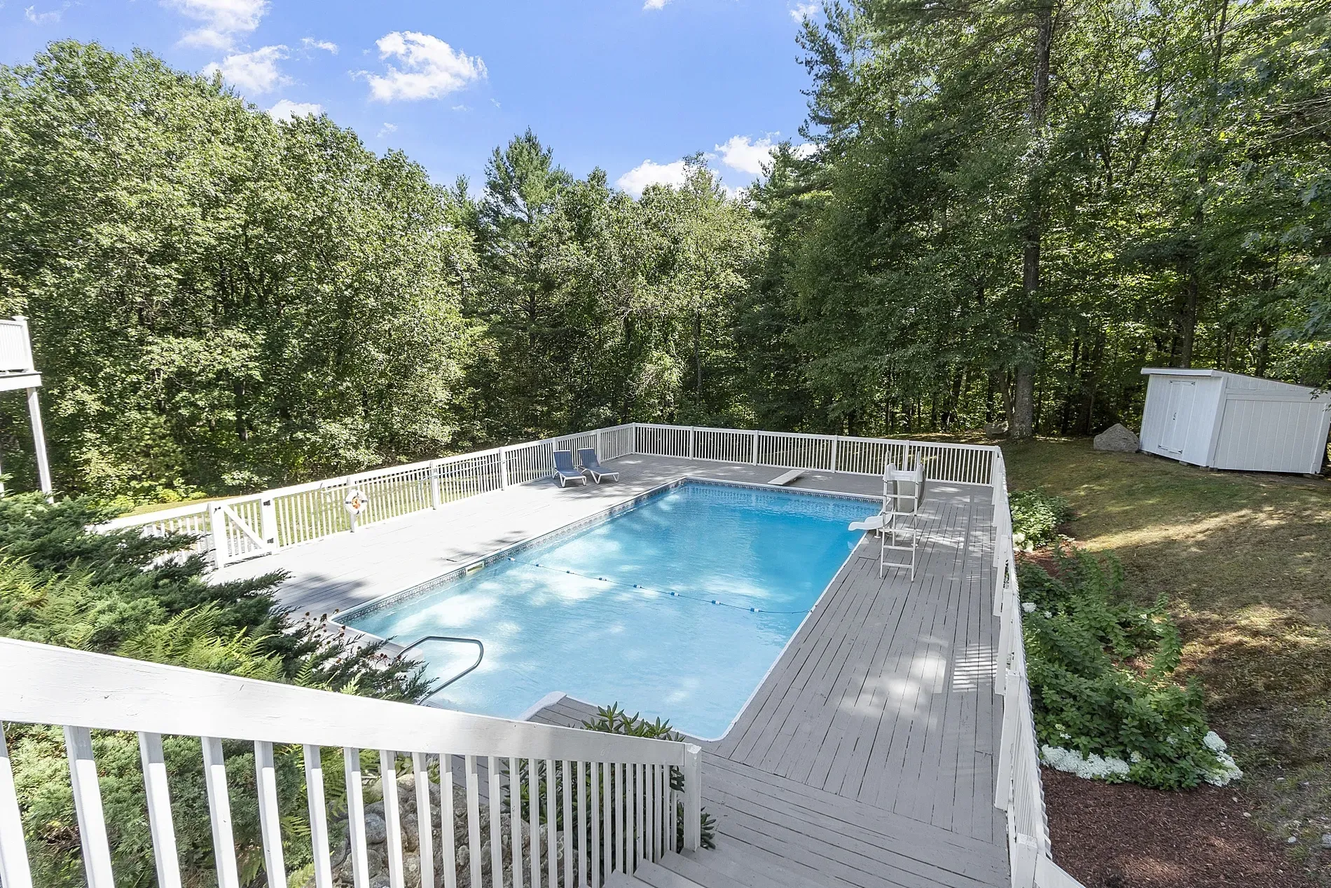 If I go missing, check this pool deck surrounded by trees.