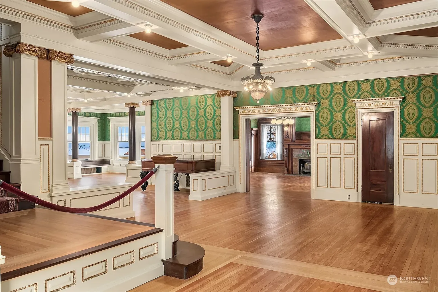 Caramel coffered ceiling steals the show. Big room, lots of architectural detail.