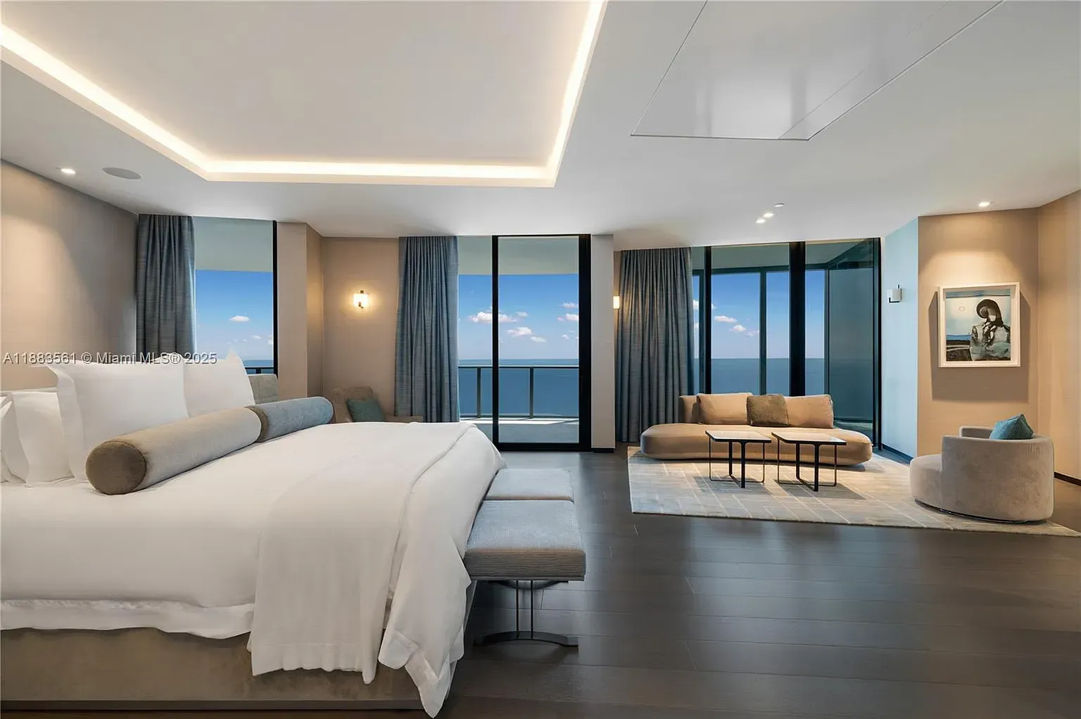 Hotel vibes. earth tones, huge bed, soft whites. Looks genuinely restful.