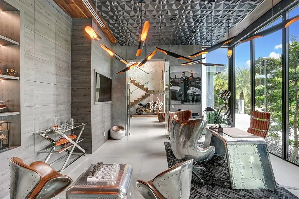 Office with wood and glass layers. Ceiling detail is doing the most.