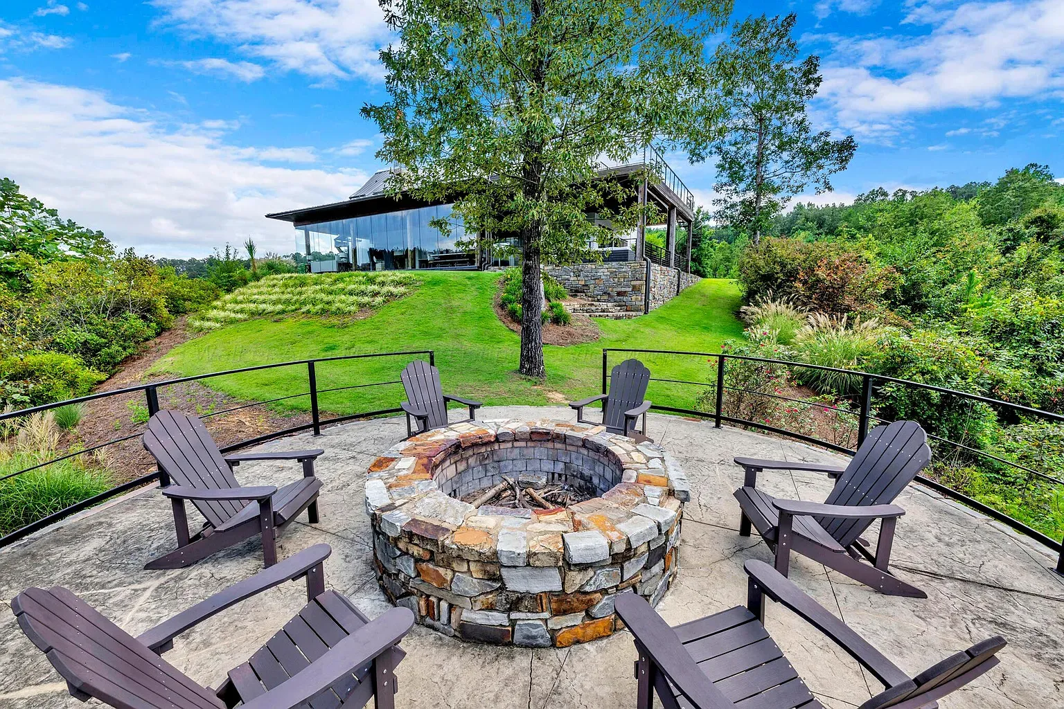 Big stone fire ring with proper chairs. S'mores and sweaters required.
