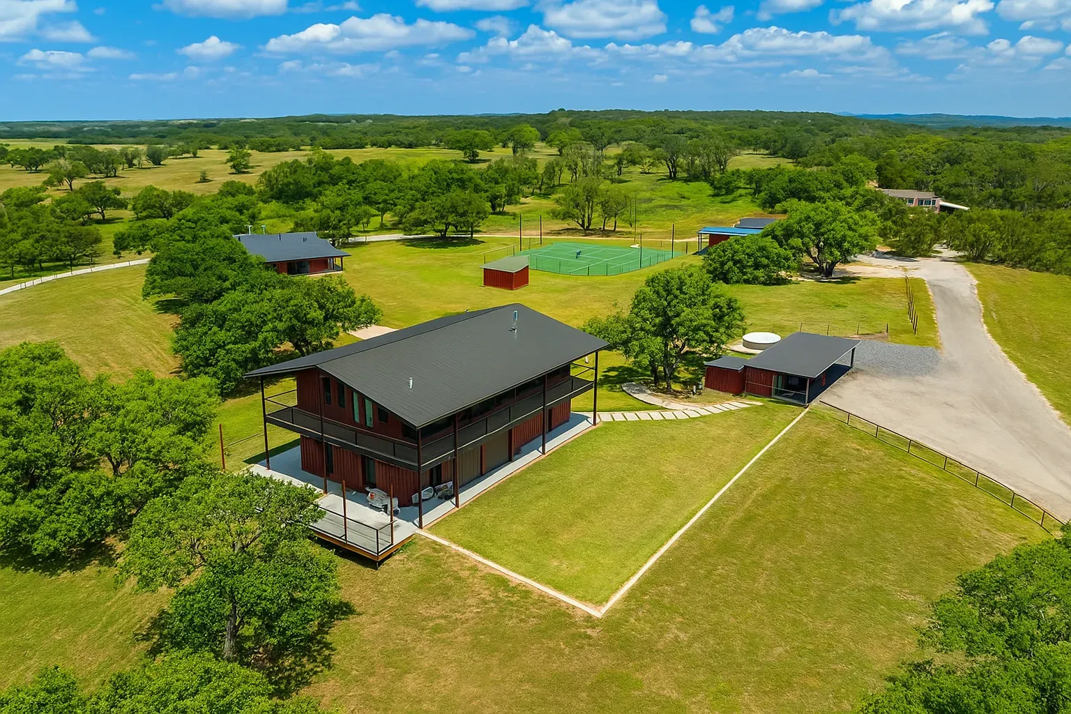 Here's the main house — dark wood, metal, low and sleek. Seven million vibes?