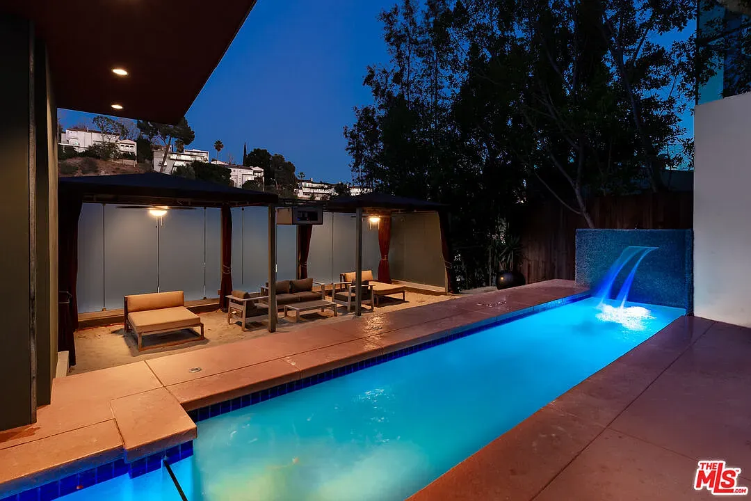 Dusk lighting makes the patio glow. Clean lines, calm vibe.