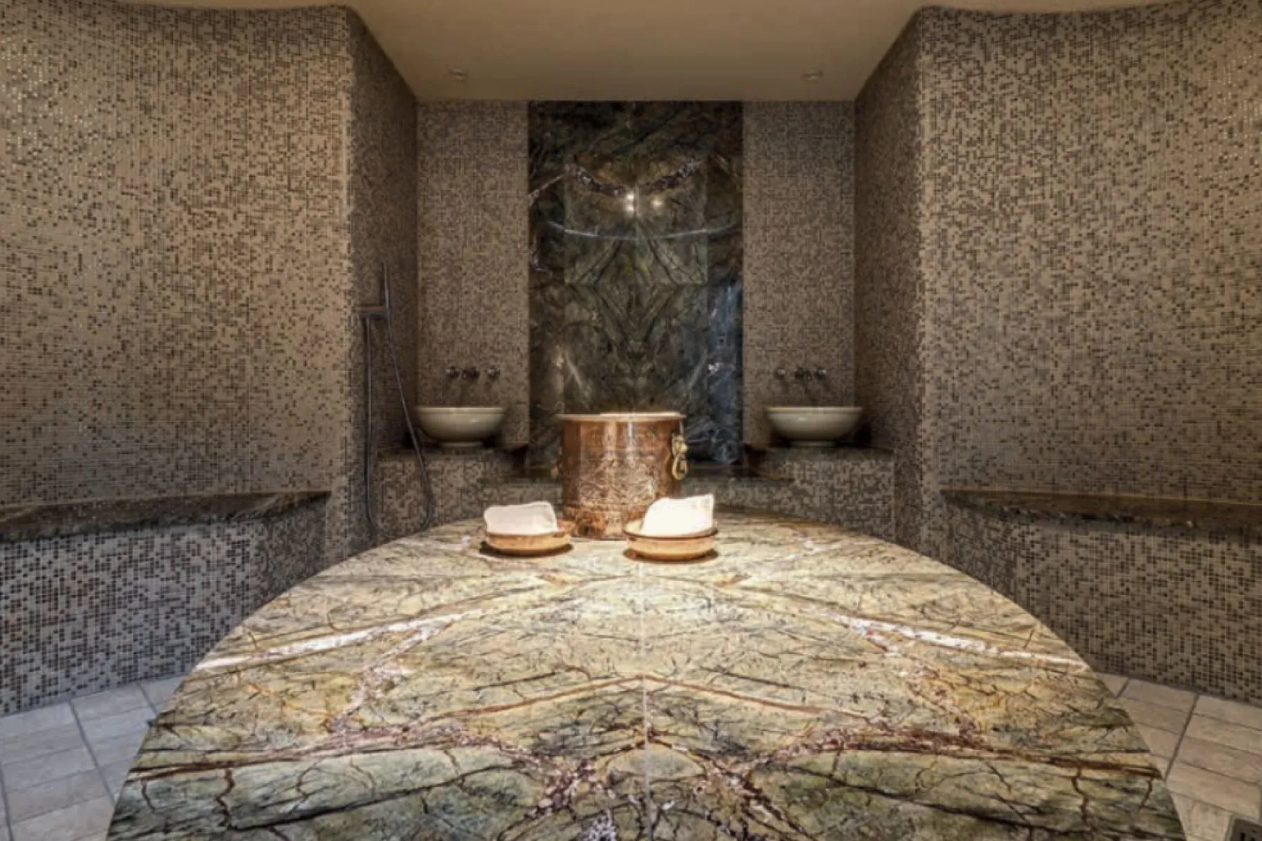 That circular green marble counter is wild. Nature painting vibes.