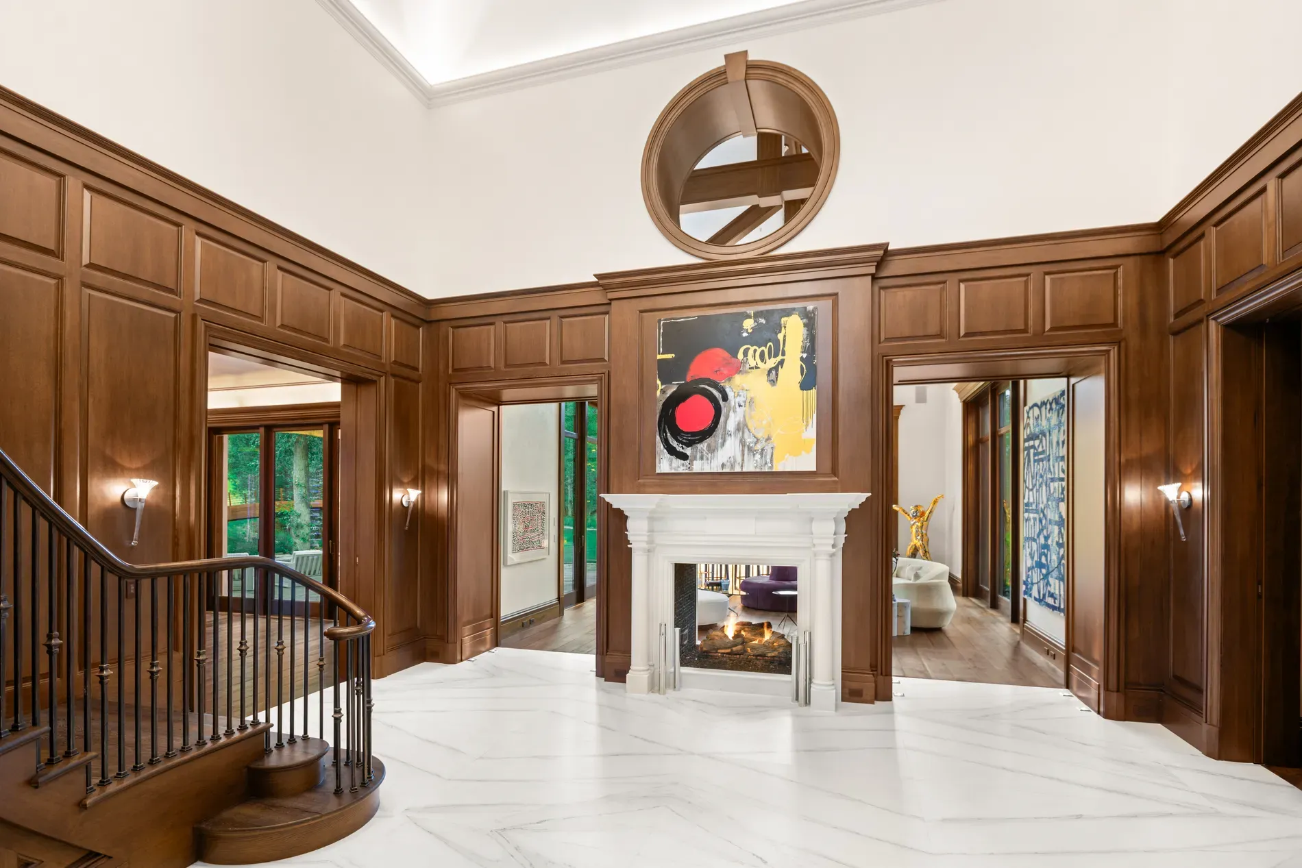 Here's the foyer—dark paneling and crisp molding. Formal but cozy.