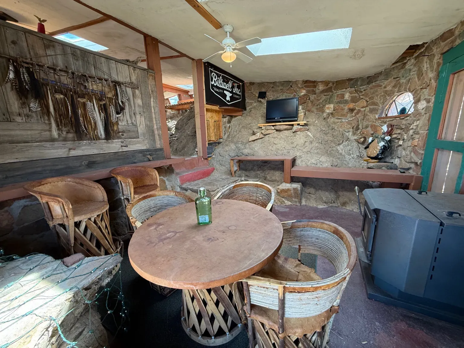 Another room carved out of rock. that centerpiece looks a natural hearth.